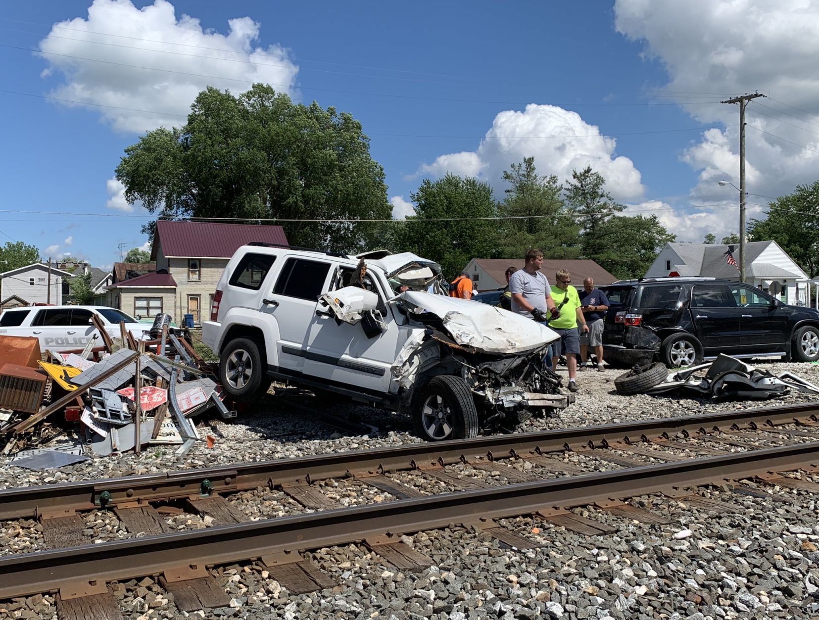 Train collides with car